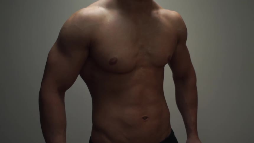Close up of a shirtless muscular man