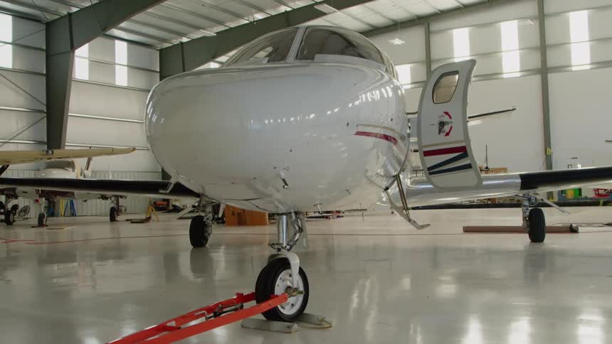 Airplane parked in hanger
