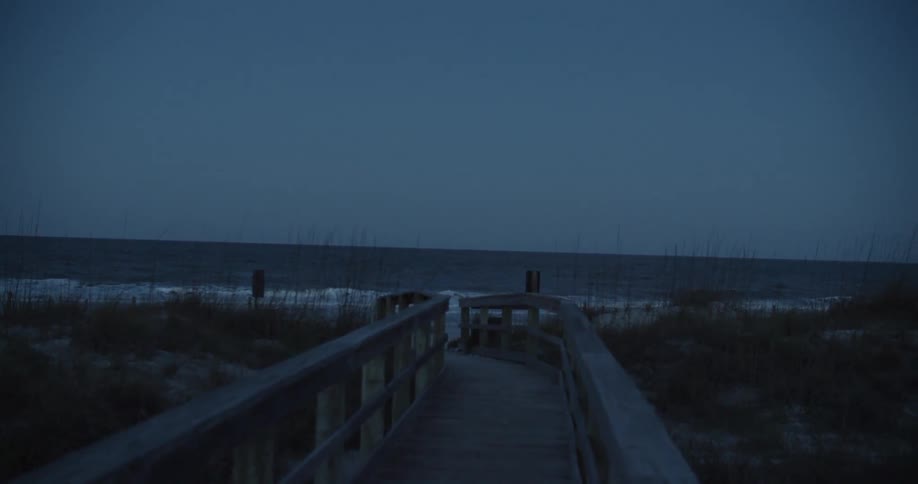 Waves flow onto the beach shore