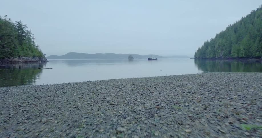 A boat floats on a lake