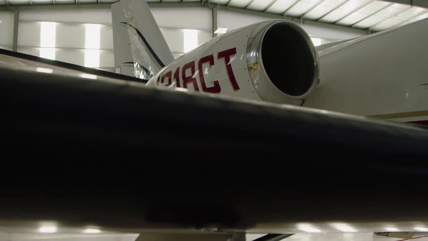 Airplane in a large airplane garage