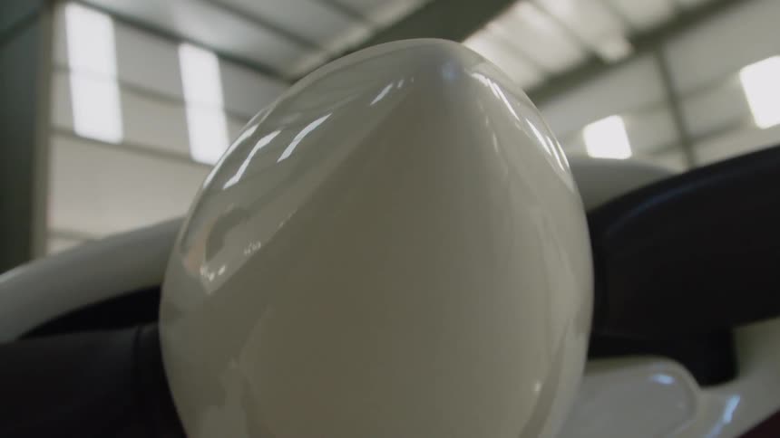 An airplane is parked in a hangar