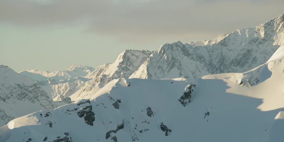 The snow is high and covering the mountain range
