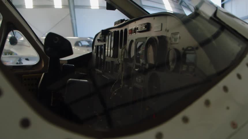 Airplane sits in a hangar