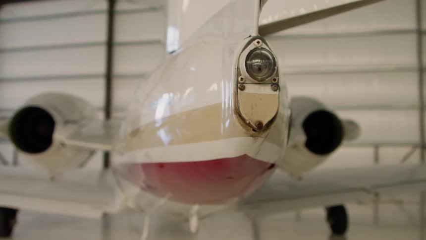 Airplane in a large airplane garage