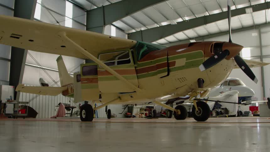 Airplane in a large airplane garage