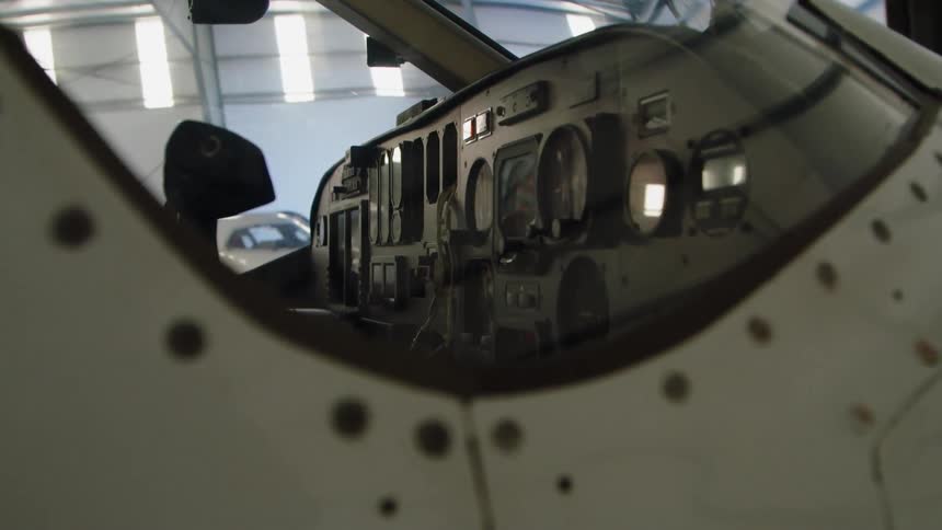 Airplane in a large airplane garage