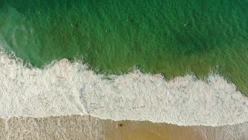 The water is green blow near the shore