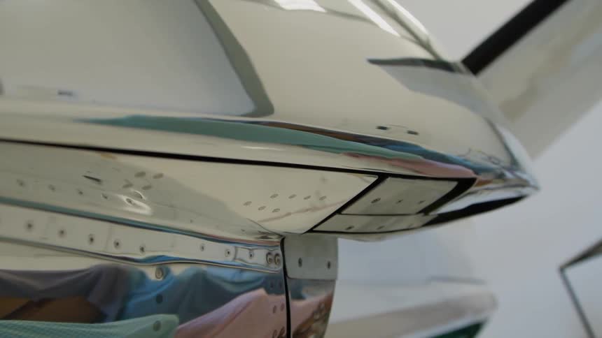 The plane has polished reflective metal