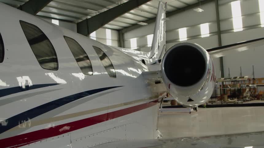 Airplane in a large airplane garage