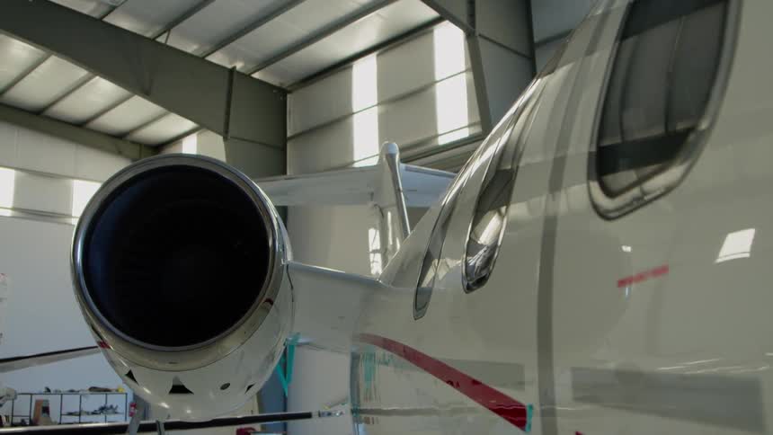 Airplane in a large airplane garage