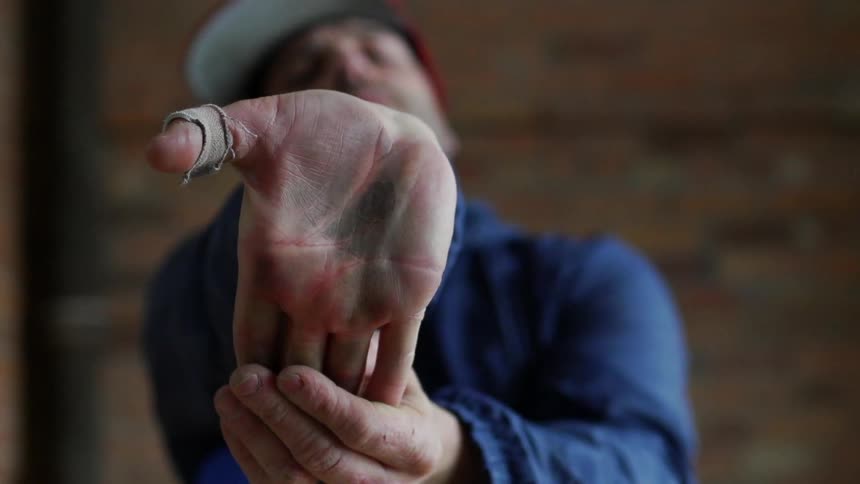 A man is stretching his fingers