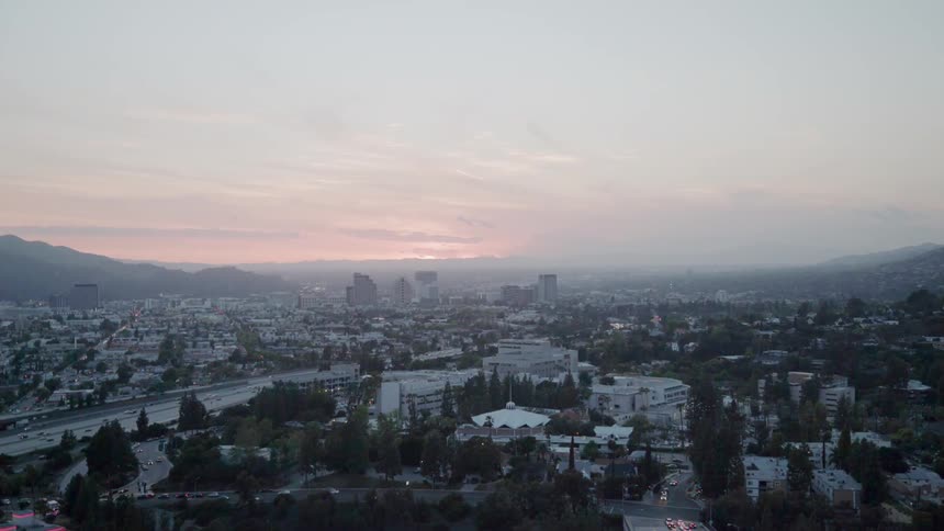 The fog covers the city in the distance