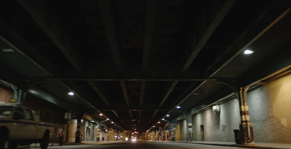 The cars travel under the train platform