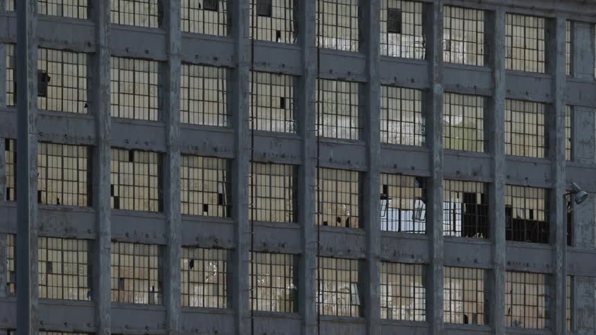 Some of the windows on this building are broken