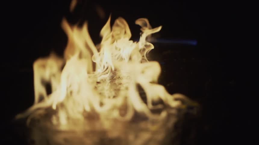Fire is raging in a dark area