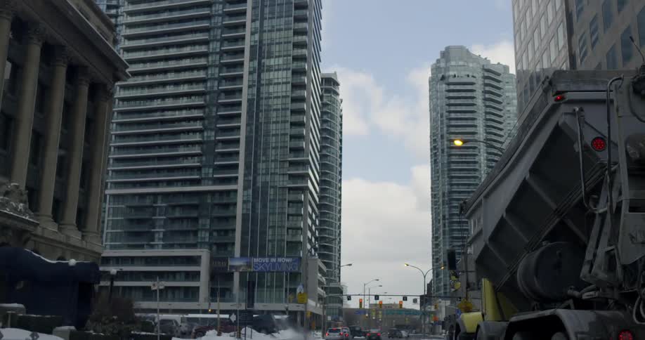 View of a city street with tall buildings