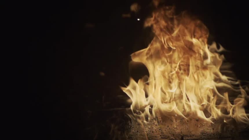 Flames burning on wood