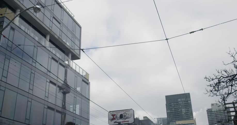 View of some buildings in a city on a cloudy day