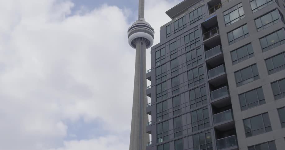 Looking up at an oddly shaped building