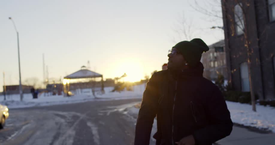 Man throwing a snowball on a winter day