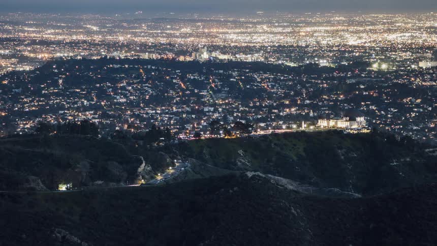 Mountains and a large city down below