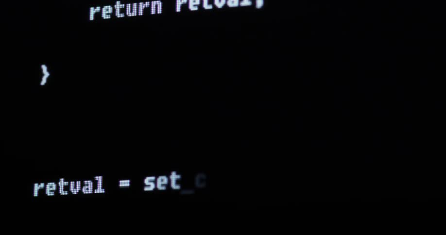 Words flash across a dark screen