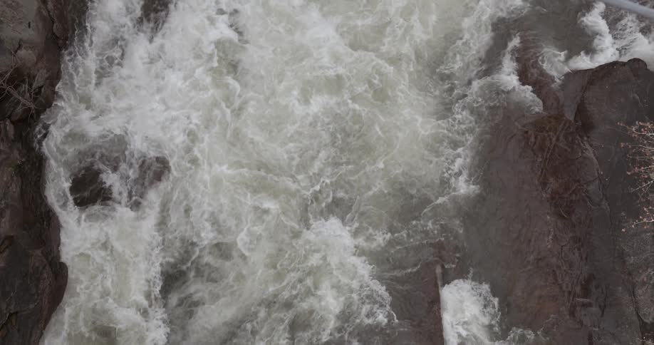 White water rushes over stones and rocks