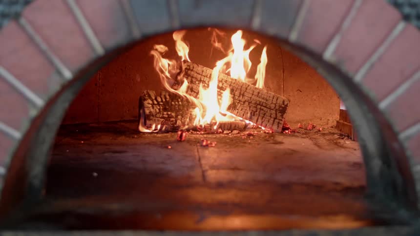 The logs are burning in the fireplace