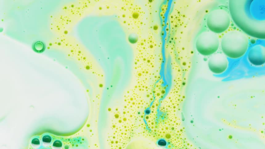 Yellow and blue liquid swirls and flows