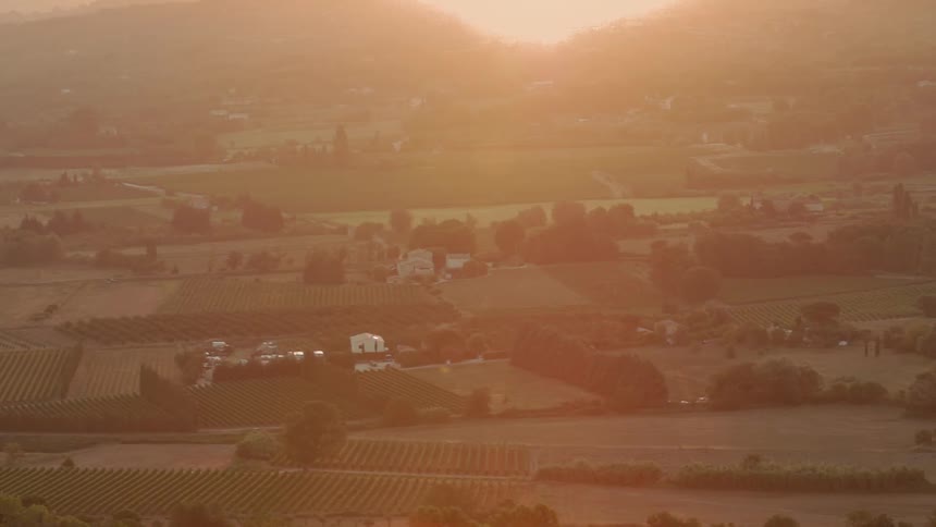 Small village sits under a sunny sky