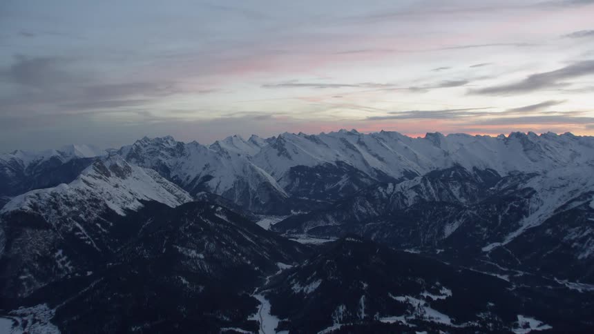 Snow and ice cover the mountainous landscape