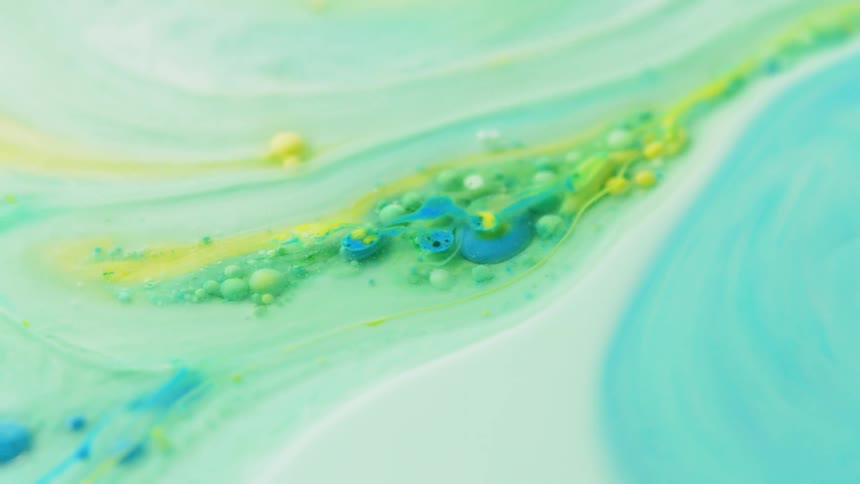 Colorful paint flows and swirls