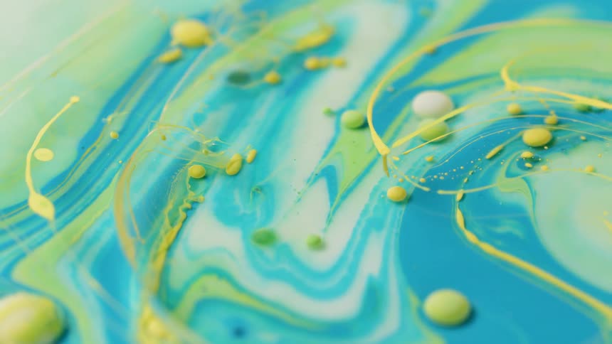 Different colors of bubbles and swirling liquid