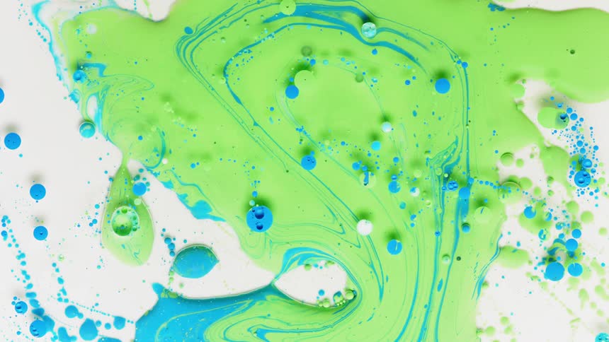 Green blue and white liquid swirls and bubbles