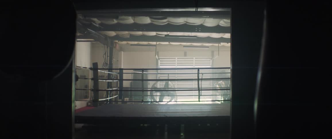 Cord dangles near a boxing ring