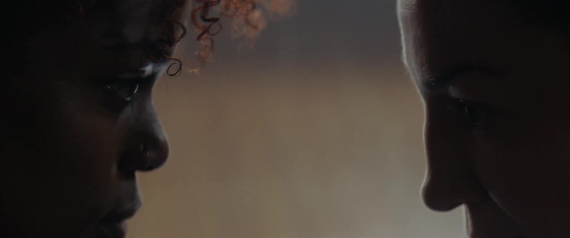 Two people stare at each other