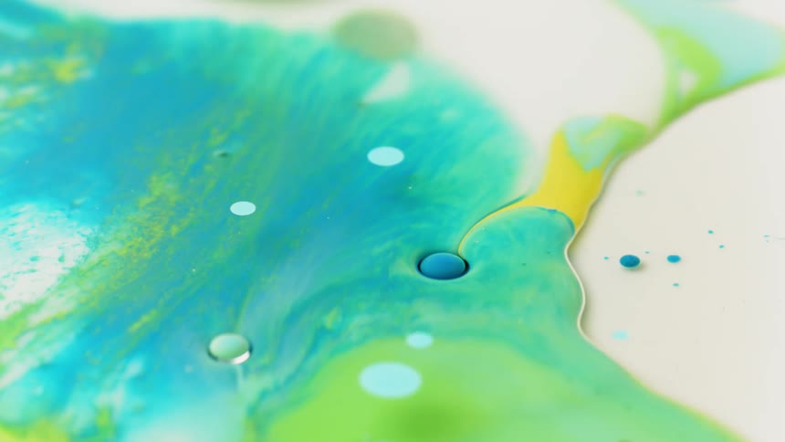 Colorful paint flows and swirls