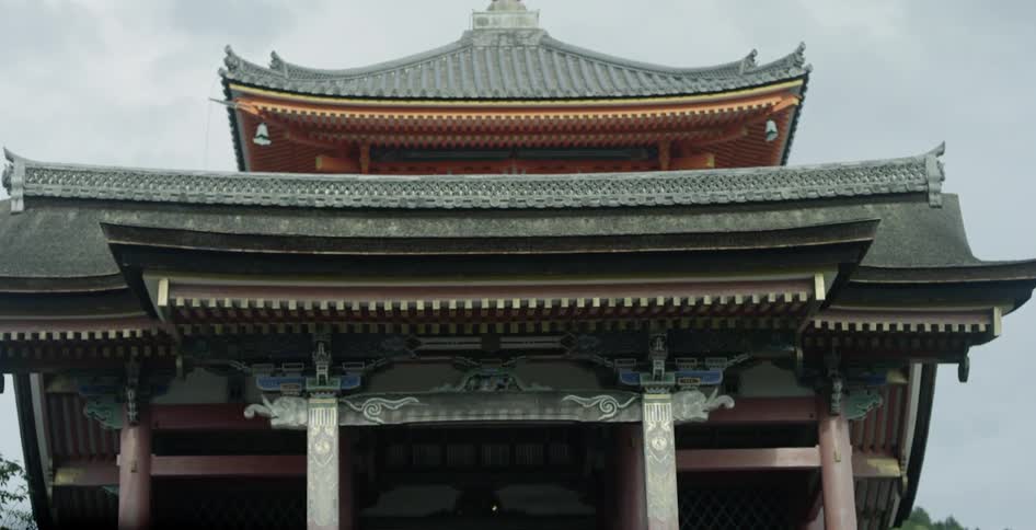 The building has a green and gold roof
