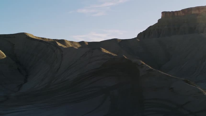 The rocks are covered in shade on this mountain range