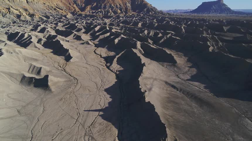 Peaked ridges of a barren landscape on a sunny day