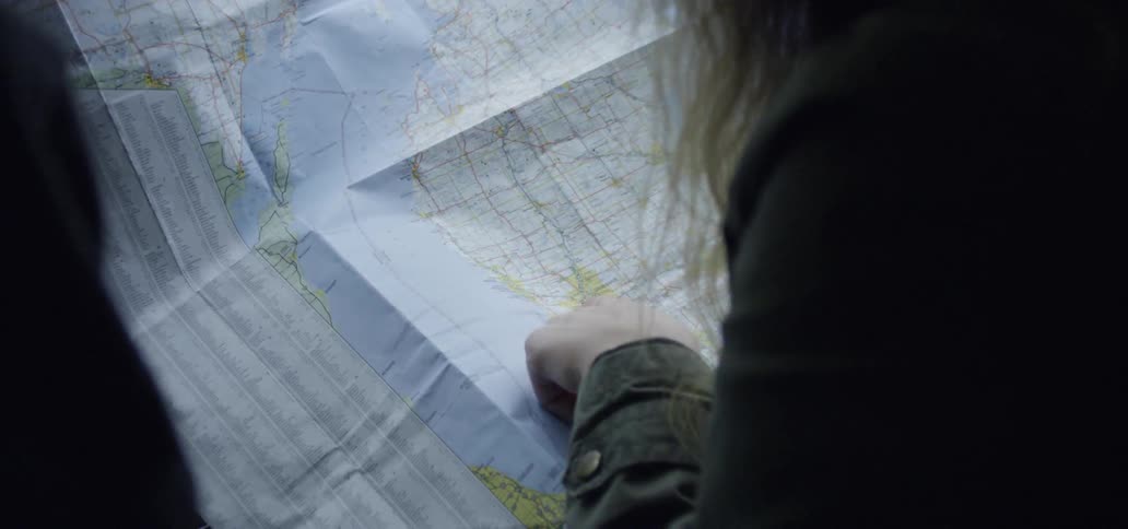 People look at a map together