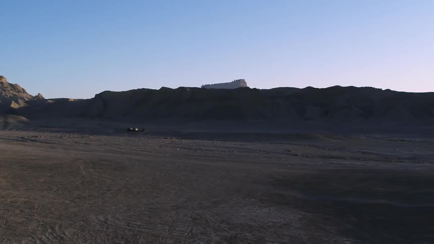 Dry arid area with high rock formations on a clear day