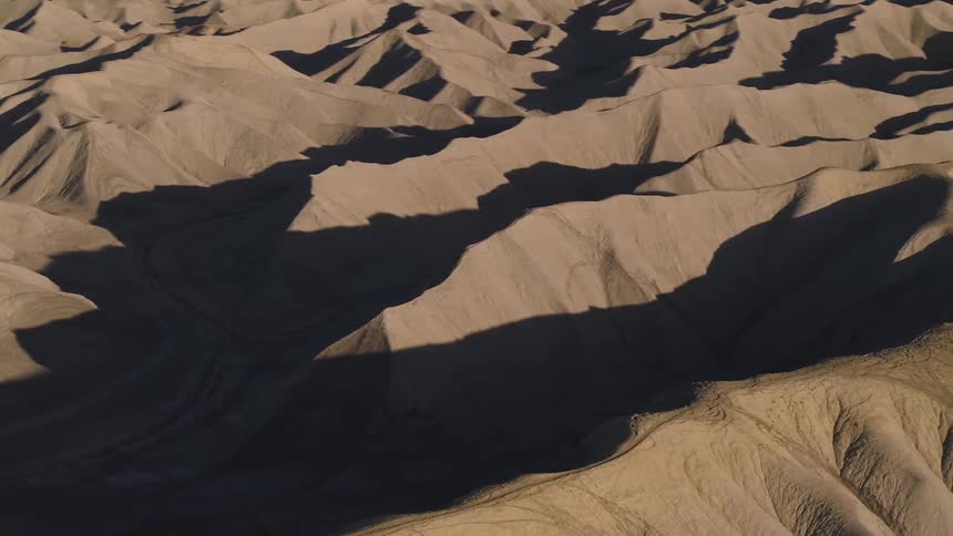 The dunes in this desert are covered in shade