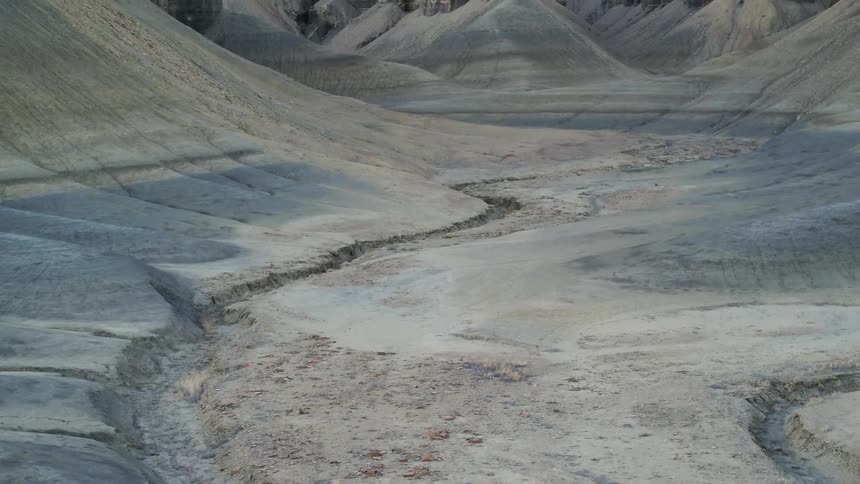 Path winds through a hilly desert