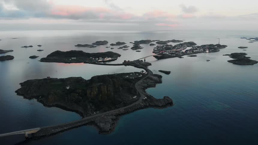 A bridge stretches across islands in the water