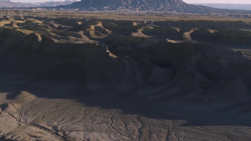 Shadows in a sandy hilly desert