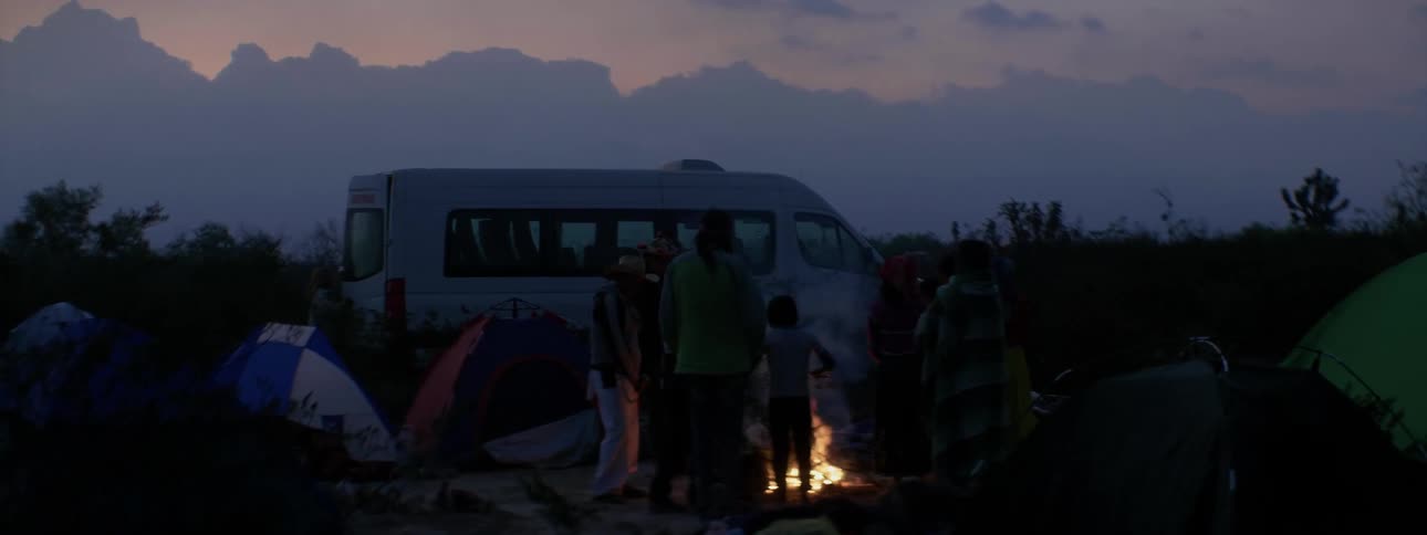 A group of people camp outside