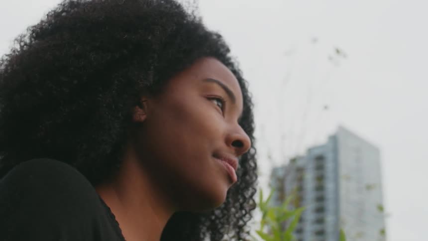 Woman looking out at the city