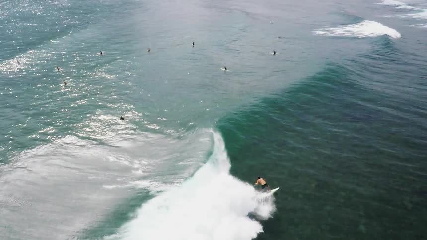 Overhead view of person surfing in the ocean